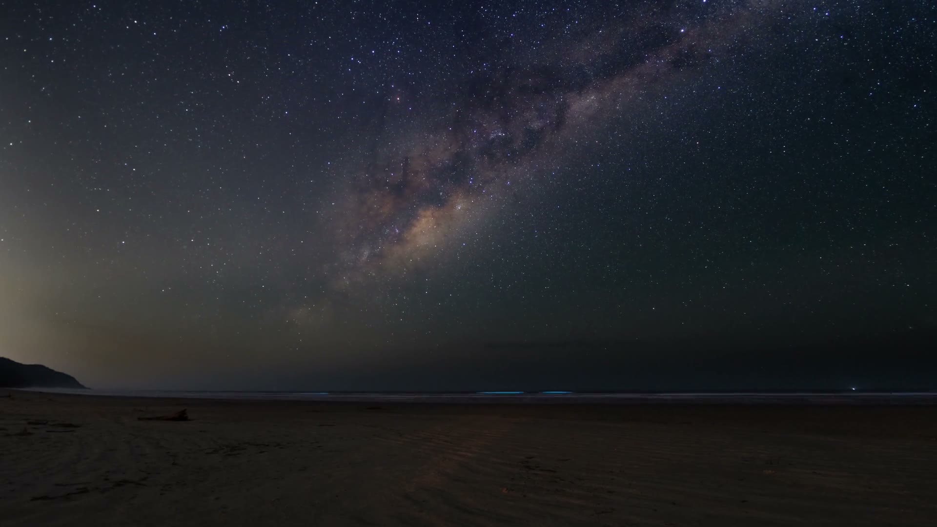 The Milky Way above a beach at night